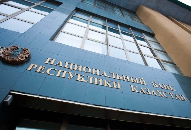 Kazakh Banks Face Double Bind on Deposit Rule as Tenge Plummets