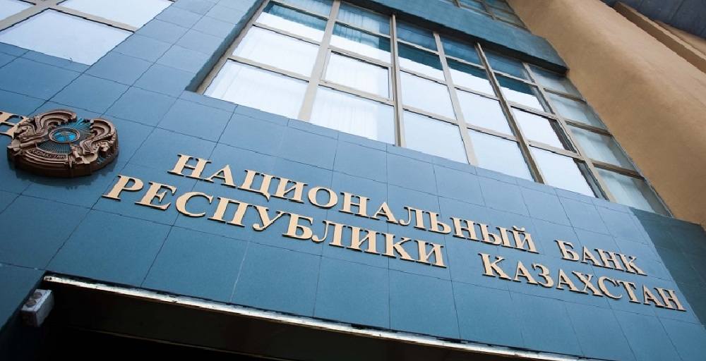 Kazakh Banks Face Double Bind on Deposit Rule as Tenge Plummets